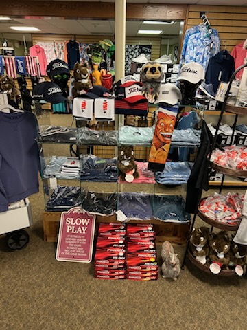 A display of various style of golf clothes at the pro shop.